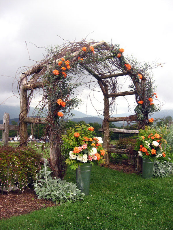 Garden wedding arbor with fall style decorations