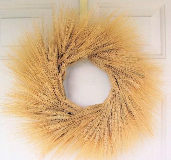 Our birch candle holders would look great with a wheat wedding wreath