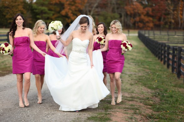 The hot pink bridesmaid dresses are a great pop of color while the rustic 